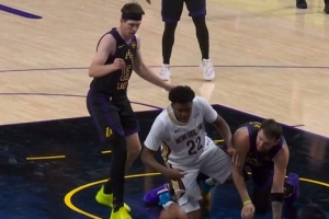 卖力！东契奇积极回防干扰奎因上篮 倒地拼抢还为湖人赢得球权 - 资讯配图